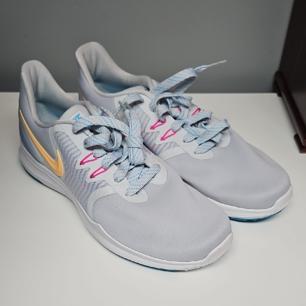 Nike Women's Gray Sneakers with Pink and Yellow Accents